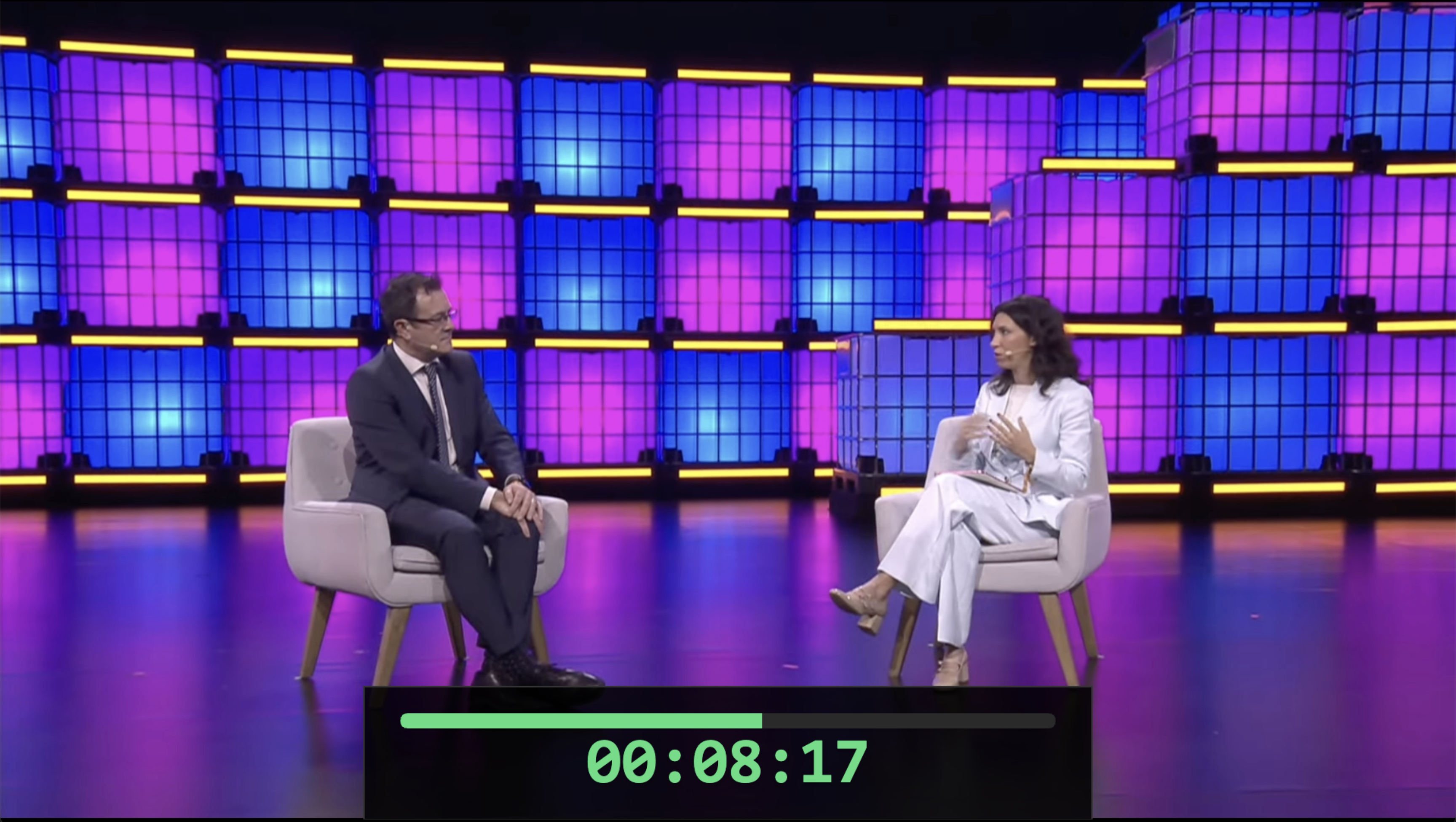 Live conference stage with Rocket Timer countdown overlay showing 00:08:17